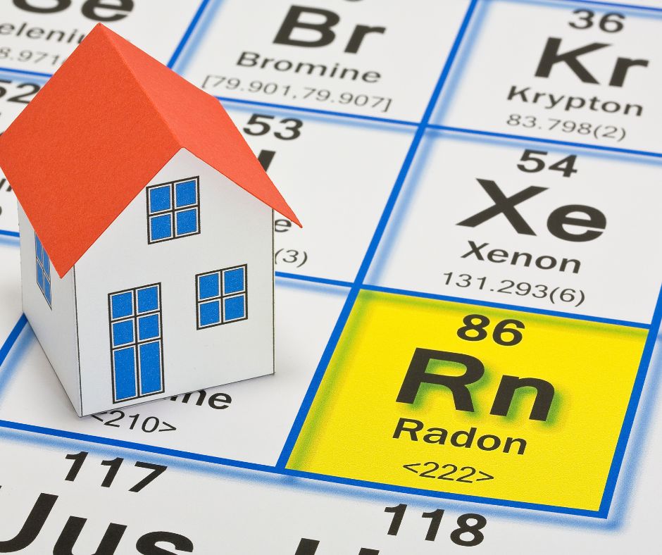 The danger of natural radon gas in our homes - concept with the Mendeleev periodic table of the elements and residential home model
